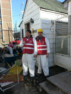 MHA-NYC employees volunteering for a muck-out in the Rockaways, January 2013