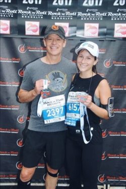 Taylor Clark and her dad after the 2017 Rock 'n Roll Half Marathon