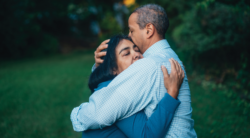 man and woman hugging